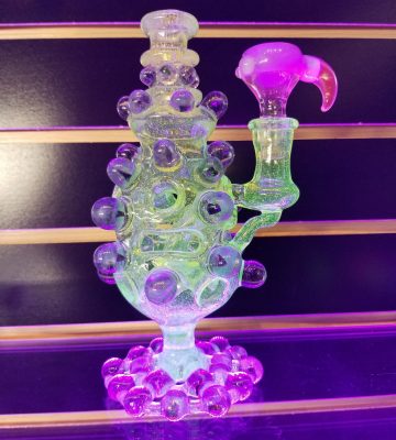 Detailed custom glass pipe in neon lighting